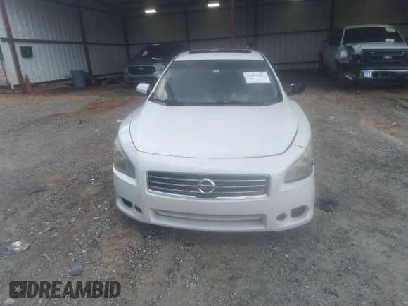 2014 Nissan Maxima SV z VIN 1N4AA5APXEC434383, wystawiony jako IAAI lot #42901633 z przebiegiem 140 159 mil mil oraz . Historia ofert i sprzedaży dostępna na DreamBid. Obrazek 12.