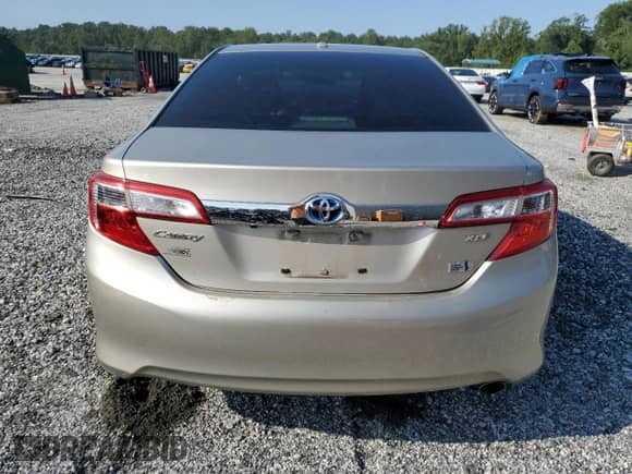 2014 Toyota Camry LE with VIN 4T1BD1FK8EU106252, listed as a Copart auction lot 68969405 with 256,940 mi miles and Salvage title. Bid and sale history available at DreamBid. Image 6.