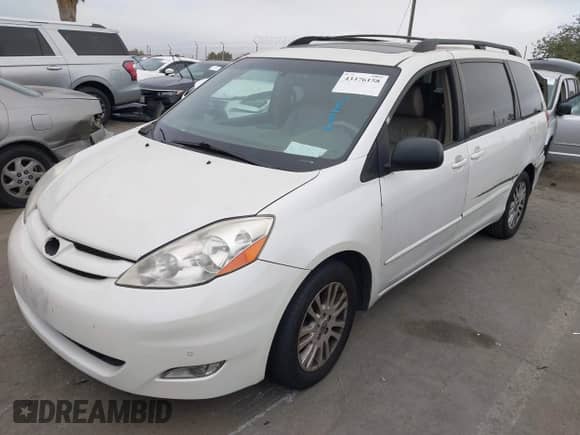 2009 Toyota Sienna XLE with VIN 5TDZK22C19S235473, listed as a IAAI auction lot 43376158 with 110,574 mi miles and . Bid and sale history available at DreamBid. Image 2.