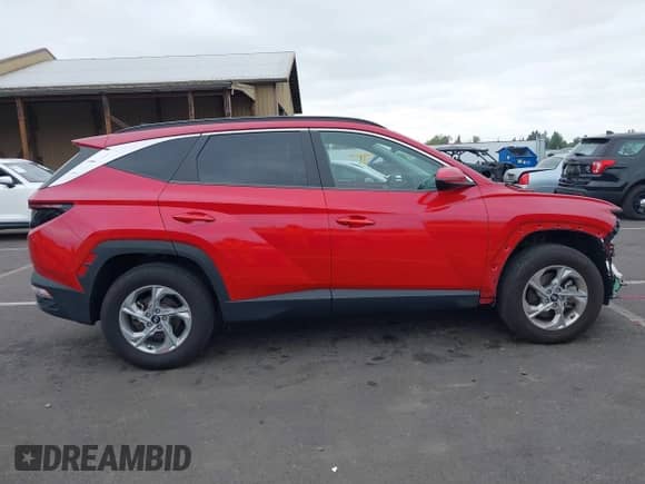 2022 Hyundai Tucson SEL with VIN 5NMJBCAE8NH054681, listed as a IAAI auction lot 43193682 with 33,510 mi miles and . Bid and sale history available at DreamBid. Image 14.