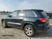 2013 Jeep Grand Cherokee Limited z VIN 1C4RJFBG7DC648943, wystawiony jako Copart lot #85731515 z przebiegiem 200 146 mil mil oraz Szkoda całkowita • Salvage title. Historia ofert i sprzedaży dostępna na DreamBid. Obrazek 2.