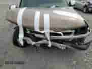 2004 Chevrolet Suburban LT с VIN 1GNEC16ZX4J202005, выставлен на аукционе Copart как лот 71371514 с пробегом Не указан миль и Списание • Salvage title. История ставок и продаж доступна на DreamBid. Изображение 12.