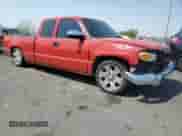 2003 GMC Sierra 1500 SLE with VIN 2GTEC19V231300391, listed as a Copart auction lot 64077725 with 194,727 mi miles and Salvage title. Bid and sale history available at DreamBid. Image 4.