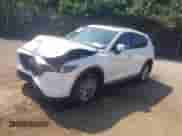 2023 Mazda CX-5 S Preferred z VIN JM3KFBCM2P0249791, wystawiony jako IAAI lot #42831354 z przebiegiem 31 858 mil mil oraz . Historia ofert i sprzedaży dostępna na DreamBid. Obrazek 2.