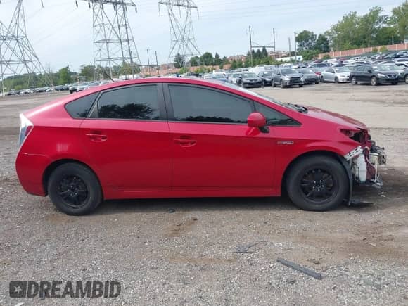 2015 Toyota Prius Persona Series with VIN JTDKN3DU2F0410901, listed as a IAAI auction lot 43292409 with 143,337 mi miles and . Bid and sale history available at DreamBid. Image 14.