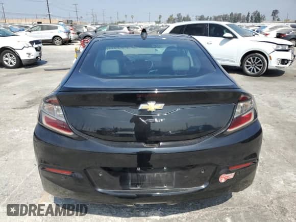 2018 Chevrolet Volt Premier с VIN 1G1RD6S56JU127152, выставлен на аукционе Copart как лот 70391075 с пробегом 53 798 миль миль и Списание • Salvage title. История ставок и продаж доступна на DreamBid. Изображение 6.