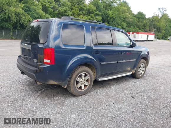 2009 Honda Pilot Touring with VIN 5FNYF48879B037564, listed as a IAAI auction lot 42683848 with 197,897 mi miles and . Bid and sale history available at DreamBid. Image 4.