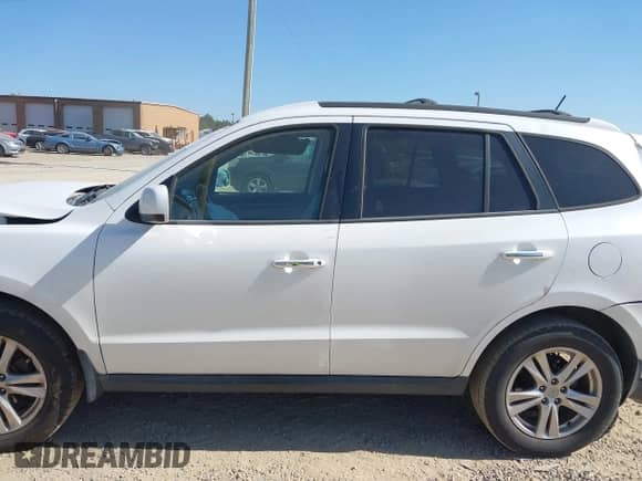2012 Hyundai Santa Fe Limited z VIN 5XYZK4AG5CG166260, wystawiony jako IAAI lot #42113627 z przebiegiem 137 934 mil mil oraz . Historia ofert i sprzedaży dostępna na DreamBid. Obrazek 14.