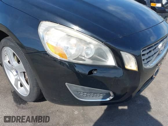2013 Volvo S60 T5 Premier z VIN YV1612FS0D1213942, wystawiony jako IAAI lot #42667474 z przebiegiem 175 094 mil mil oraz . Historia ofert i sprzedaży dostępna na DreamBid. Obrazek 12.
