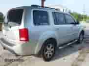 2009 Honda Pilot Touring with VIN 5FNYF38839B022943, listed as a IAAI auction lot 42443006 with 199,184 mi miles and . Bid and sale history available at DreamBid. Image 4.