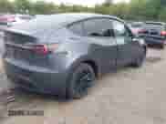 2022 Tesla Model Y Long Range z VIN 7SAYGDEE9NA018029, wystawiony jako IAAI lot #43211378 z przebiegiem 59 492 mil mil oraz . Historia ofert i sprzedaży dostępna na DreamBid. Obrazek 4.