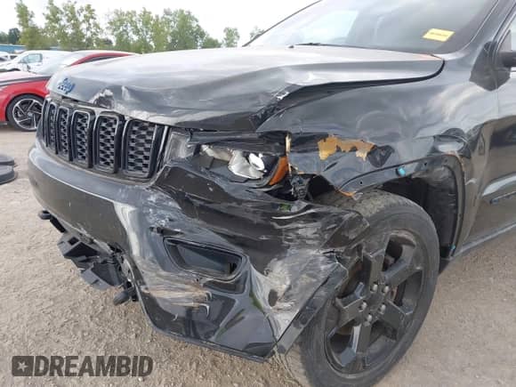 2020 Jeep Grand Cherokee Laredo E with VIN 1C4RJFAG3LC134667, listed as a IAAI auction lot 43103196 with 107,832 mi miles and . Bid and sale history available at DreamBid. Image 6.