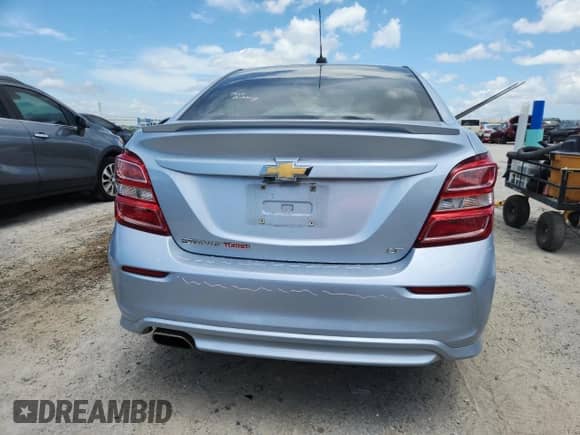 2017 Chevrolet Sonic LT with VIN 1G1JD5SB9H4123359, listed as a Copart auction lot 64223815 with 136,587 mi miles and Salvage title. Bid and sale history available at DreamBid. Image 6.