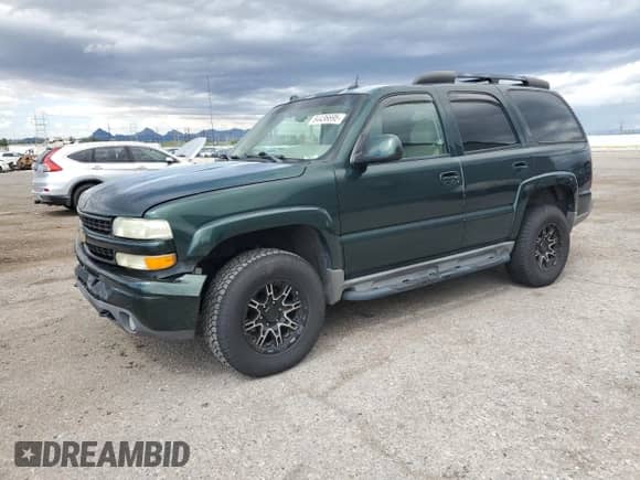 2004 Chevrolet Tahoe Z71 with VIN 1GNEK13Z44R310676, listed as a Copart auction lot 84436695 with 205,493 mi miles and Salvage title. Bid and sale history available at DreamBid. Image 1.