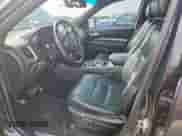 2015 Dodge Durango R/T with VIN 1C4SDHCT4FC176283, listed as a Copart auction lot 69117905 with 180,329 mi miles and Salvage title. Bid and sale history available at DreamBid. Image 7.
