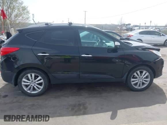 2013 Hyundai Tucson GLS с VIN KM8JUCAC7DU608465, выставлен на аукционе IAAI как лот 41990289 с пробегом 85 358 миль миль и . История ставок и продаж доступна на DreamBid. Изображение 13.