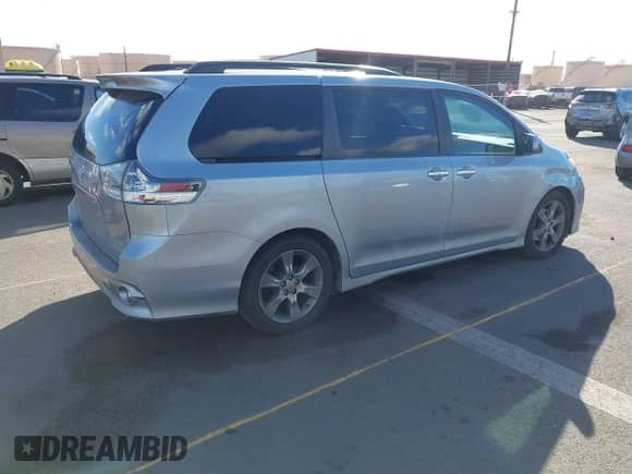 2015 Toyota Sienna SE with VIN 5TDXK3DC1FS541224, listed as a IAAI auction lot 41207154 with 146,788 mi miles and . Bid and sale history available at DreamBid. Image 4.