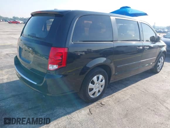 2014 Dodge Grand Caravan American Value with VIN 2C4RDGBG9ER162902, listed as a IAAI auction lot 43043596 with 89,719 mi miles and . Bid and sale history available at DreamBid. Image 4.