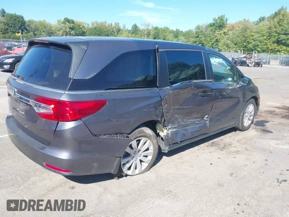 2018 Honda Odyssey LX with VIN 5FNRL6H2XJB075976, listed as a IAAI auction lot 43202706 with 36,254 mi miles and . Bid and sale history available at DreamBid. Image 4.