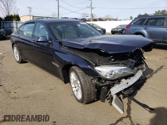 2015 BMW 7 Series with VIN WBAYG6C53FD383679, listed as a Copart auction lot 40007773 with 58,328 mi miles and . Bid and sale history available at DreamBid. Image 4.