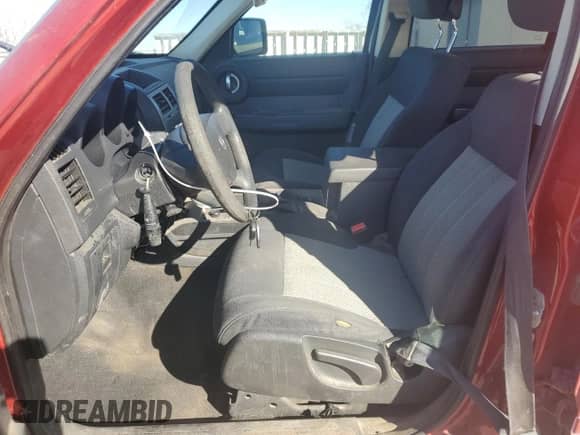 2010 Dodge Nitro SE with VIN 1D4PU2GK5AW119671, listed as a Copart auction lot 42454185 with 206,764 mi miles and Salvage title. Bid and sale history available at DreamBid. Image 7.