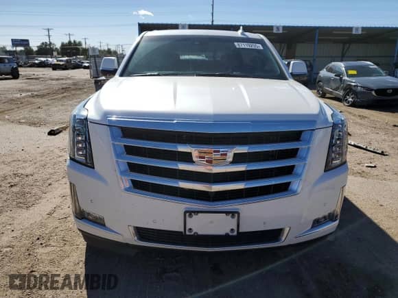 2018 Cadillac Escalade Luxury с VIN 1GYS4BKJ7JR162312, выставлен на аукционе Copart как лот 87119255 с пробегом 70 663 миль миль и Списание • Salvage title. История ставок и продаж доступна на DreamBid. Изображение 5.