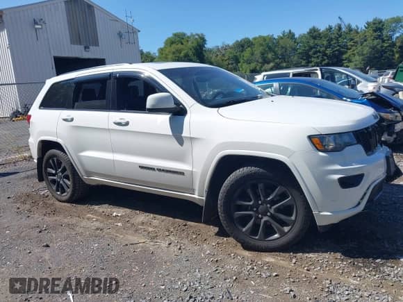 2020 Jeep Grand Cherokee Altitude with VIN 1C4RJFAG2LC337162, listed as a IAAI auction lot 43186271 with 107,697 mi miles and . Bid and sale history available at DreamBid. Image 13.