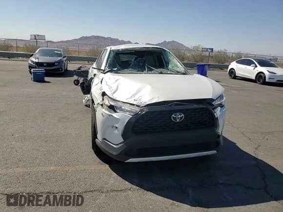 2022 Toyota Corolla Cross L with VIN 7MUAAAAG9NV013567, listed as a Copart auction lot 68475575 with 29,475 mi miles and Salvage title. Bid and sale history available at DreamBid. Image 13.