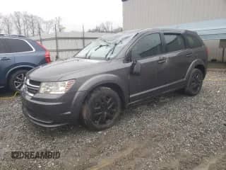 2014 Dodge Journey American Value with VIN 3C4PDCAB2ET149525, listed as a Copart auction lot 42501205 with 190,540 mi miles and Salvage title. Bid and sale history available at DreamBid. Image 1.
