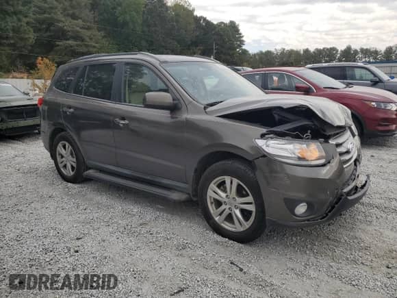 2012 Hyundai Santa Fe Limited с VIN 5XYZK3AB5CG142412, выставлен на аукционе Copart как лот 82600135 с пробегом 139 986 миль миль и Чистый • Clean title. История ставок и продаж доступна на DreamBid. Изображение 4.