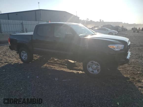 2023 Toyota Tacoma SR с VIN 3TMCZ5AN1PM589920, выставлен на аукционе Copart как лот 81328205 с пробегом 67 306 миль миль и Списание • Salvage title. История ставок и продаж доступна на DreamBid. Изображение 4.