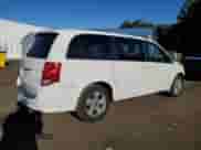 2013 Dodge Grand Caravan SE with VIN 2C4RDGBG1DR727447, listed as a Copart auction lot 84536815 with 121,739 mi miles and Salvage title. Bid and sale history available at DreamBid. Image 3.