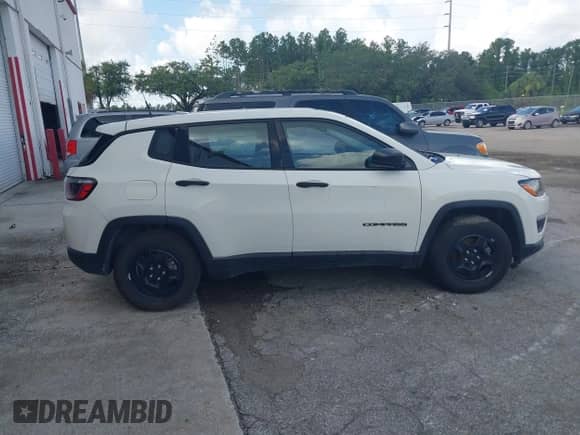 2018 Jeep Compass Sport with VIN 3C4NJCAB5JT263450, listed as a IAAI auction lot 42288257 with 115,860 mi miles and . Bid and sale history available at DreamBid. Image 13.