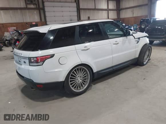 2015 Land Rover Range Rover Sport HSE z VIN SALWR2VF0FA508683, wystawiony jako IAAI lot #42066639 z przebiegiem 122 565 mil mil oraz . Historia ofert i sprzedaży dostępna na DreamBid. Obrazek 4.
