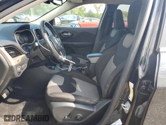2014 Jeep Cherokee Latitude с VIN 1C4PJMCB5EW177759, выставлен на аукционе Copart как лот 81013045 с пробегом 141 691 миль миль и Списание • Salvage title. История ставок и продаж доступна на DreamBid. Изображение 7.