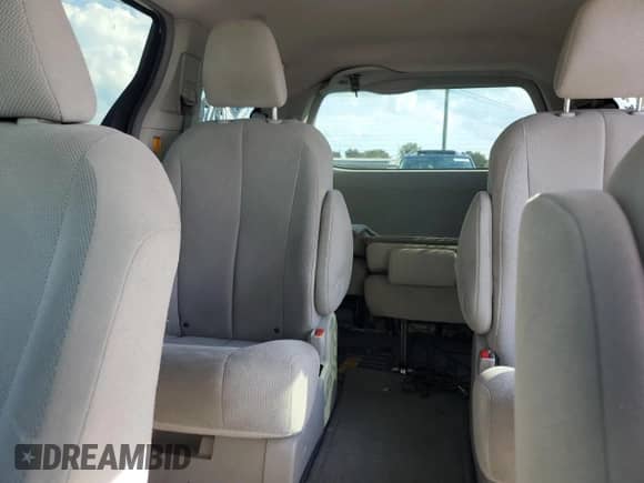 2012 Toyota Sienna with VIN 5TDZK3DC2CS184186, listed as a Copart auction lot 71013535 with 172,772 mi miles and Salvage title. Bid and sale history available at DreamBid. Image 10.
