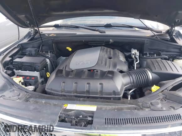 2012 Jeep Grand Cherokee Overland z VIN 1C4RJECT6CC311572, wystawiony jako IAAI lot #43343686 z przebiegiem 163 181 mil mil oraz . Historia ofert i sprzedaży dostępna na DreamBid. Obrazek 10.