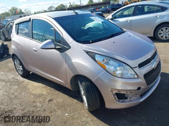 2013 Chevrolet Spark LS z VIN KL8CB6S93DC583599, wystawiony jako IAAI lot #43396778 z przebiegiem 101 563 mil mil oraz . Historia ofert i sprzedaży dostępna na DreamBid. Obrazek 1.