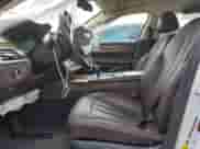 2017 BMW 7 Series 740i xDrive with VIN WBA7E4C59HGU99296, listed as a Copart auction lot 60886265 with Not provided miles and Salvage title. Bid and sale history available at DreamBid. Image 7.