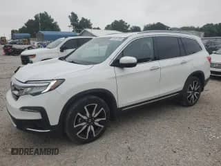2021 Honda Pilot Touring 7-Passenger z VIN 5FNYF6H66MB037252, wystawiony jako Copart lot #66961365 z przebiegiem 61 239 mil mil oraz Szkoda całkowita • Salvage title. Historia ofert i sprzedaży dostępna na DreamBid. Obrazek 1.