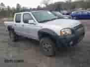 2001 Nissan Frontier SE with VIN 1N6ED27T91C318489, listed as a IAAI auction lot 41441798 with 214,834 mi miles and . Bid and sale history available at DreamBid. Image 1.