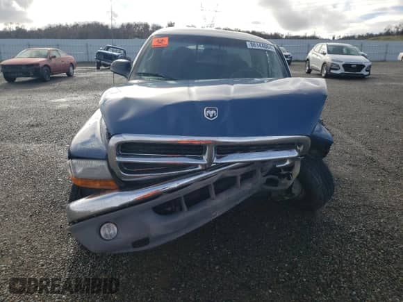 2004 Dodge Dakota SLT с VIN 1D7HG42N44S507739, выставлен на аукционе Copart как лот 86144064 с пробегом 103 922 миль миль и Списание • Salvage title. История ставок и продаж доступна на DreamBid. Изображение 5.