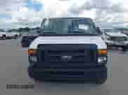 2013 Ford Econoline Cargo Commercial with VIN 1FTNE2EW1DDB21585, listed as a IAAI auction lot 42107682 with 266,895 mi miles and . Bid and sale history available at DreamBid. Image 12.