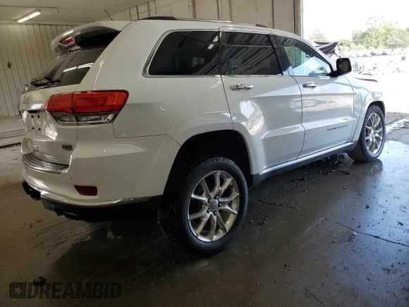 2015 Jeep Grand Cherokee Summit с VIN 1C4RJFJM0FC761675, выставлен на аукционе Copart как лот 69062605 с пробегом 153 313 миль миль и Списание • Salvage title. История ставок и продаж доступна на DreamBid. Изображение 3.