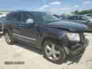 2013 Jeep Grand Cherokee Limited with VIN 1C4RJFBG5DC629923, listed as a Copart auction lot 66639035 with 136,993 mi miles and Salvage title. Bid and sale history available at DreamBid. Image 4.