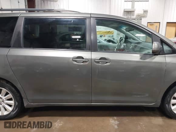 2012 Toyota Sienna LE with VIN 5TDJK3DC7CS045989, listed as a IAAI auction lot 42525117 with 150,919 mi miles and . Bid and sale history available at DreamBid. Image 14.