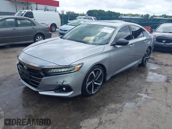 2021 Honda Accord Sport with VIN 1HGCV2F35MA004560, listed as a IAAI auction lot 42746583 with 63,997 mi miles and . Bid and sale history available at DreamBid. Image 2.