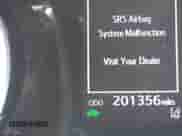 2021 Toyota Camry Hybrid LE with VIN 4T1C31AK5MU561685, listed as a IAAI auction lot 43388923 with 201,356 mi miles and . Bid and sale history available at DreamBid. Image 15.