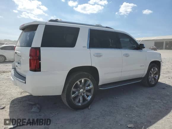 2016 Chevrolet Tahoe LTZ with VIN 1GNSCCKC4GR473440, listed as a Copart auction lot 70414425 with 158,224 mi miles and Salvage title. Bid and sale history available at DreamBid. Image 3.