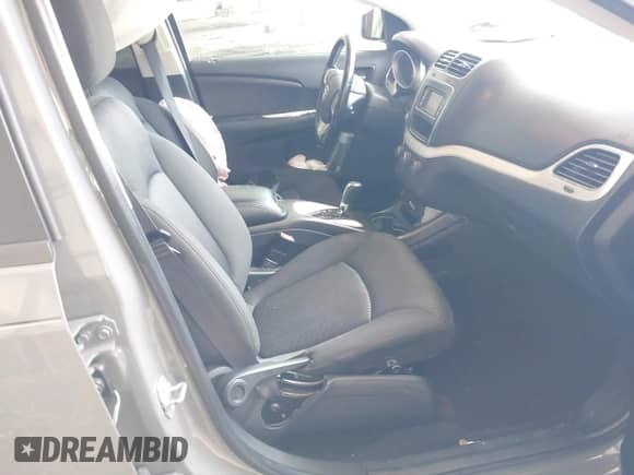 2020 Dodge Journey SE Value with VIN 3C4PDCABXLT259669, listed as a IAAI auction lot 42995598 with 98,957 mi miles and . Bid and sale history available at DreamBid. Image 5.